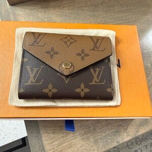 Louis Vuitton Victorine wallet in reverse monogram
